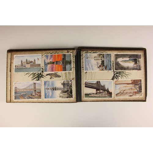 400 - A Chinoiserie lacquered album containing a collection of postcards from the first quarter of the 20t... 