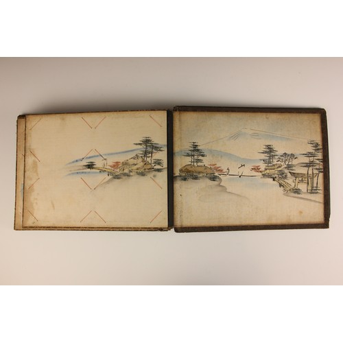 400 - A Chinoiserie lacquered album containing a collection of postcards from the first quarter of the 20t... 