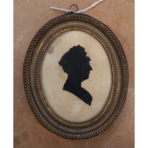 428 - English School (18th century), 
A pair of portrait silhouettes, 
Titled to the reverse 'John Edwards... 