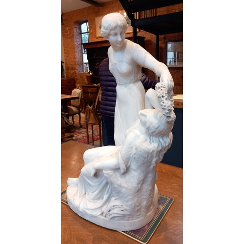 505 - George Frederick Halse (1826-1895),  A large marble figural group, modelled as a reclining maiden ha... 