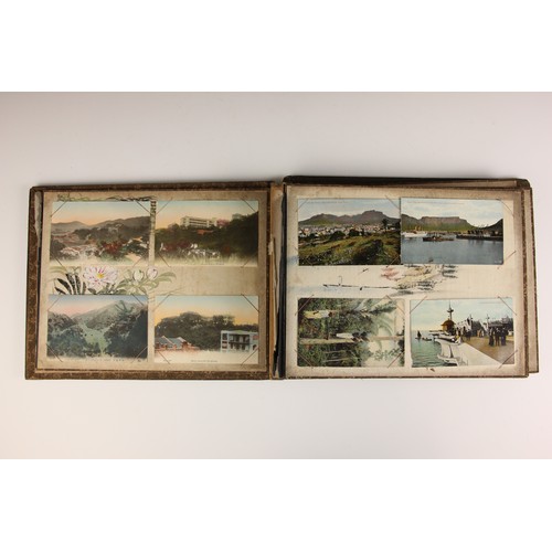 400 - A Chinoiserie lacquered album containing a collection of postcards from the first quarter of the 20t... 