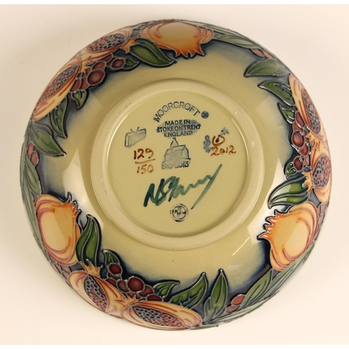 537 - A limited edition Moorcroft celadon bowl in the 'Green Pomegranate' pattern, designed by Nicola Slan... 