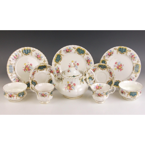 548 - A Victorian Staffordshire tea service, comprising; four teacups, a teapot and cover, a twin handled ... 