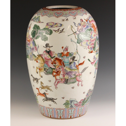 687 - A large Chinese porcelain famille rose jar, extensively decorated to the exterior with a hunting sce... 