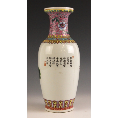 688 - A Chinese porcelain famille rose Republic style vase, decoarted with a peacock perched upon a rocky ... 