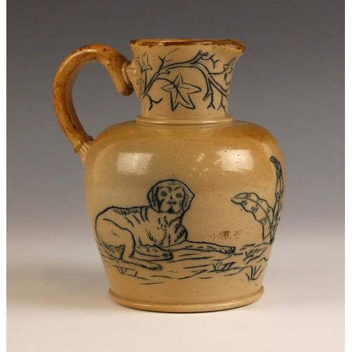 576 - A Doulton stoneware ewer in the manner of Hannah Barlow, late 19th century, the incised decoration d... 