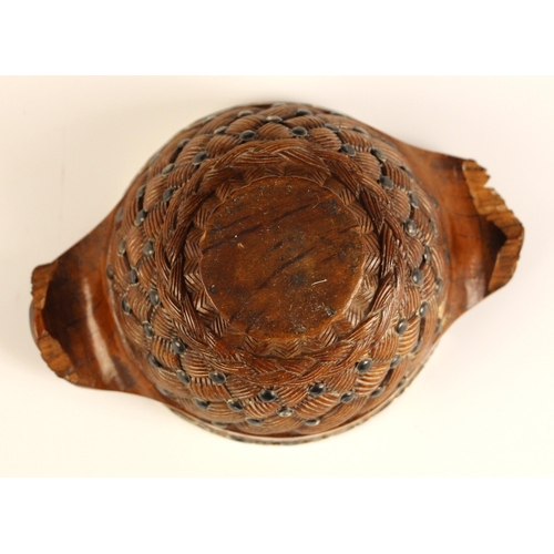 112 - A Victorian Scottish white metal-mounted carved wooden Quaich in the manner of Ferguson and MacBean ... 