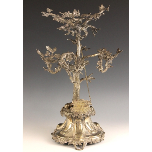 122 - A 19th century silver plated centrepiece, the central oak leaf and acorn designed mount above tree t... 