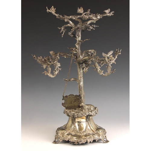 122 - A 19th century silver plated centrepiece, the central oak leaf and acorn designed mount above tree t... 