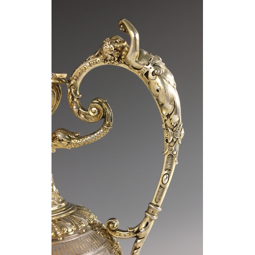 85 - A Victorian silver gilt mounted claret jug, George Edward & Sons, Edinburgh 1887, the cast handle de... 