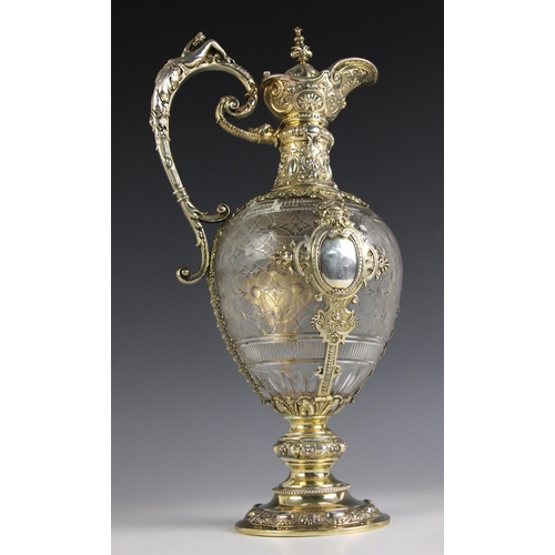 85 - A Victorian silver gilt mounted claret jug, George Edward & Sons, Edinburgh 1887, the cast handle de... 