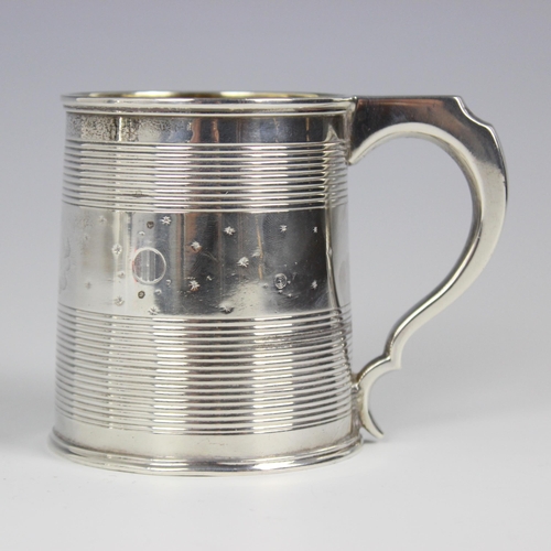 100 - An unusual  George III silver mug, Rebecca Emes & Edward Barnard I, London 1811, of tapered cylindri... 