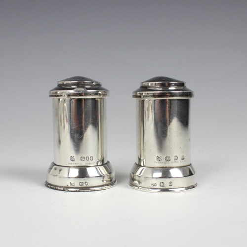 102 - A pair of Victorian silver pepperettes, Hukin & Heath, London 1894, of stylised pillar box form with... 