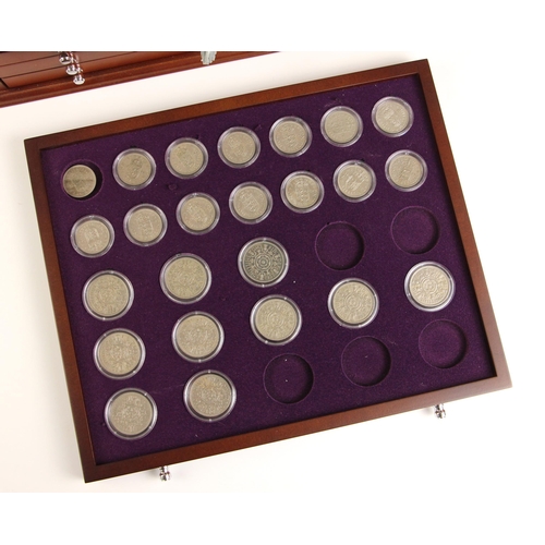 139 - Danbury Mint, The Queen Elizabeth II pre-decimal coin collection, the four drawer display cabinet en... 