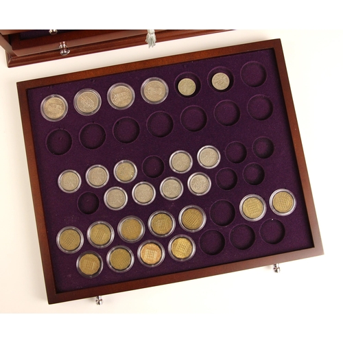 139 - Danbury Mint, The Queen Elizabeth II pre-decimal coin collection, the four drawer display cabinet en... 