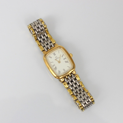 208 - A ladies Omega DeVille wristwatch, the rectangular white dial with Roman numerals, set to plain poli... 