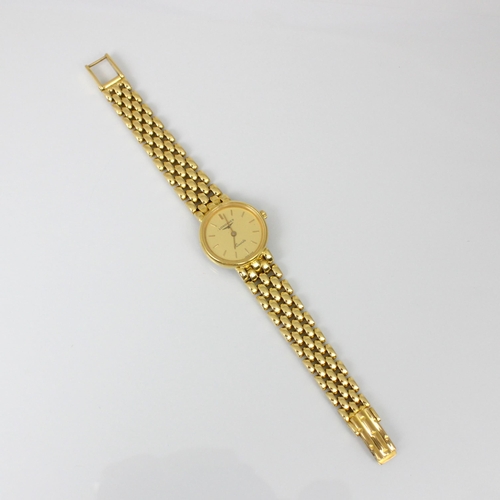 209 - A ladies yellow metal Longines quartz wristwatch, the circular gold coloured dial with baton markers... 