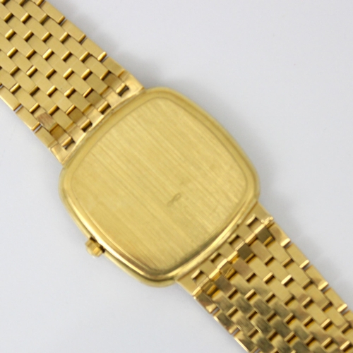 211 - A yellow metal Longines quartz wristwatch, the shaped square gold coloured dial with baton markers, ... 