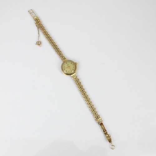 215 - A ladies yellow metal Tudor Royal wristwatch, the circular cream coloured dial with Arabic numerals,... 