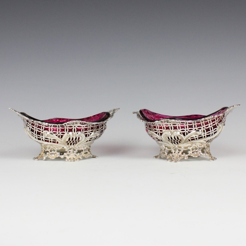 84 - A pair of Victorian silver bonbon dishes retailed by Carrington & Co, William Comyns & Sons, London,... 