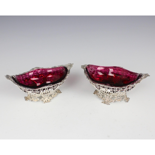 84 - A pair of Victorian silver bonbon dishes retailed by Carrington & Co, William Comyns & Sons, London,... 