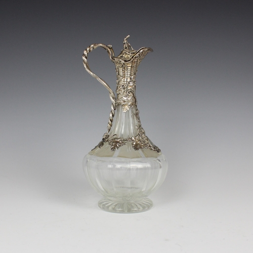 86 - A Victorian silver mounted claret jug, Charles Reily & George Storer, London 1844, the twisted handl... 