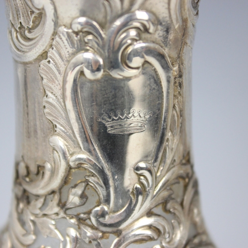 87 - A late 19th/early 20th century French white metal mounted claret jug, the domed hinged cover above C... 