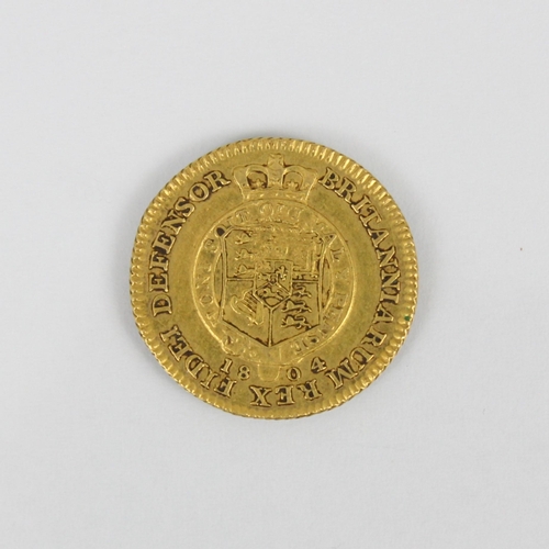 146 - George III (1760-1820) a half guinea, dated 1804, 4.2gms