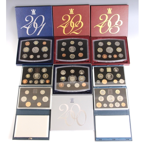 135 - A large collection of proof sets, most encapsulated and cased, circa 1970 to 2003