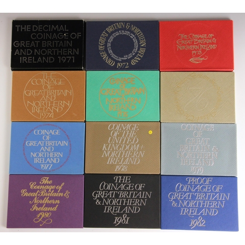 135 - A large collection of proof sets, most encapsulated and cased, circa 1970 to 2003