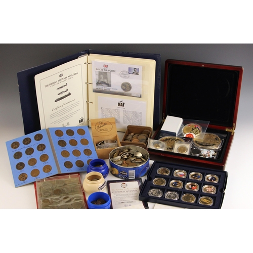 145 - A collection of commemorative and English coins to include a silver collection of The British Milita... 