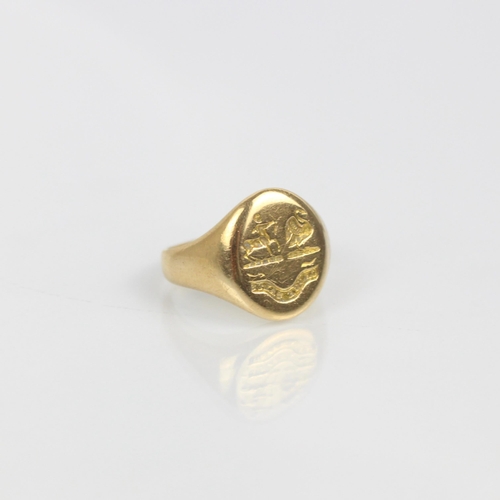 105 - An early 20th century yellow metal signet ring, the oval head with intaglio seal depicting centaur a... 