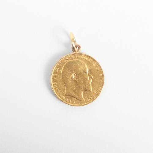 74 - An Edward VII full sovereign, dated 1909, mounted with a gold coloured pendant bale, 8.3gms