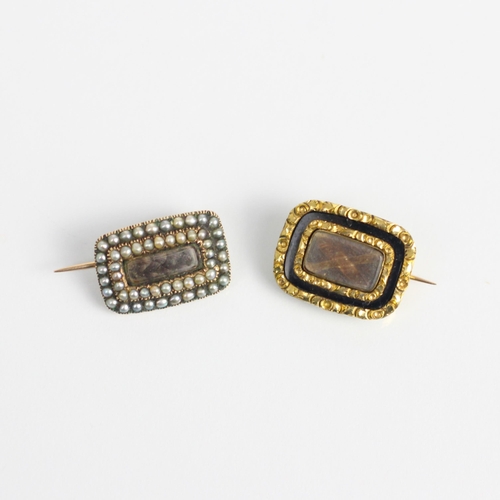 229 - A 19th century split pearl mourning brooch, the central aperture enclosing plaited hair work, within... 