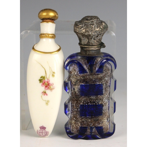 273 - A Victorian Royal Worcester porcelain scent bottle, late 19th century, of curved tapering form, hand... 