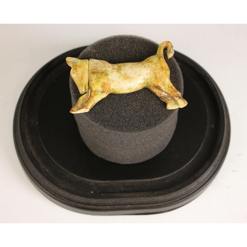 277 - An Assyrian carved bone plaque, 1st Millennium BC, carved as a bull modelled standing with its tail ... 