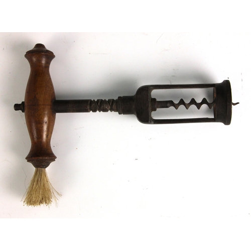 279 - A Georgian mechanical corkscrew, 19th century, with unusual double threaded shaft that allows the sc... 