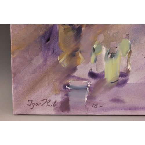 295 - Igor Zhuk (Ukrainian, contemporary),  
A seated woman reading in an artist's studio,  
Oil on canvas... 