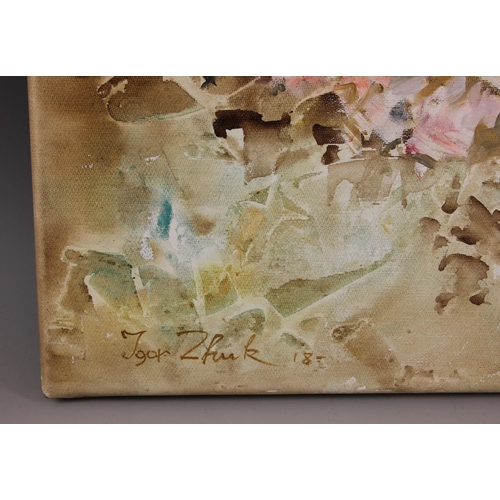 295 - Igor Zhuk (Ukrainian, contemporary),  
A seated woman reading in an artist's studio,  
Oil on canvas... 