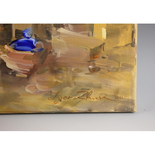 296 - Igor Zhuk (Ukrainian, contemporary),  
An artist working at her easel,  
Oil on canvas,  
Signed low... 