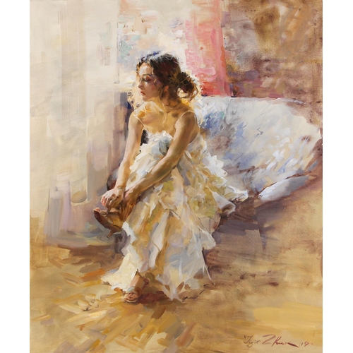 297 - Igor Zhuk (Ukrainian, contemporary),  
A seated woman in white dress removing her shoes,  
Oil on ca... 