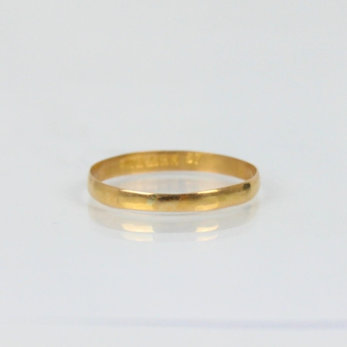 246 - A 22ct yellow gold wedding band, stamped 'SH' Birmingham, ring size S 1/2, 1.1gms