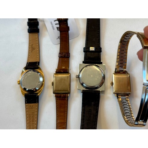 172 - A group of four Longines dress wristwatches, including a Longines Olympian example, with black dial,... 