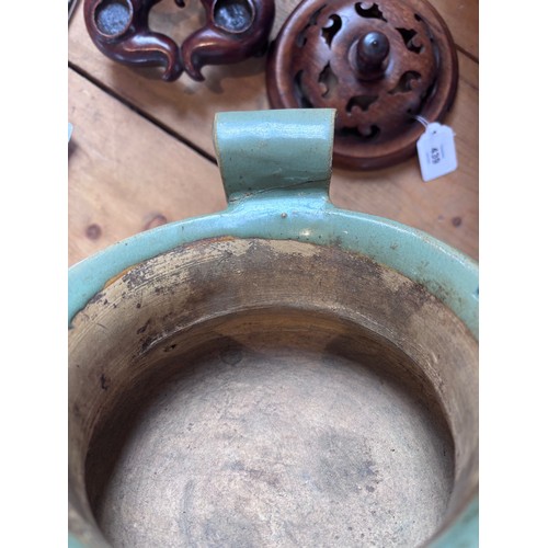 439 - A large Chinese Longquan celadon glazed incense burner, the koro of cauldron form with two scroll ha... 