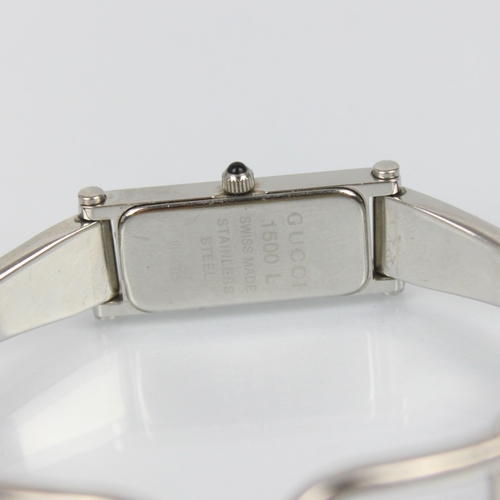 164 - A Gucci stainless steel dress watch, REF 1500L, the rectangular dial with Roman numerals, set to pla... 