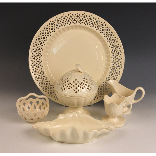 405 - A quantity of Leedsware 'Classical Creamware' pieces, 20th century and later, to include a chestnut ... 