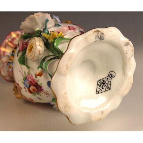 408 - An English porcelain florally encrusted stem vase, mid 19th century, of ovoid form with flared neck ... 