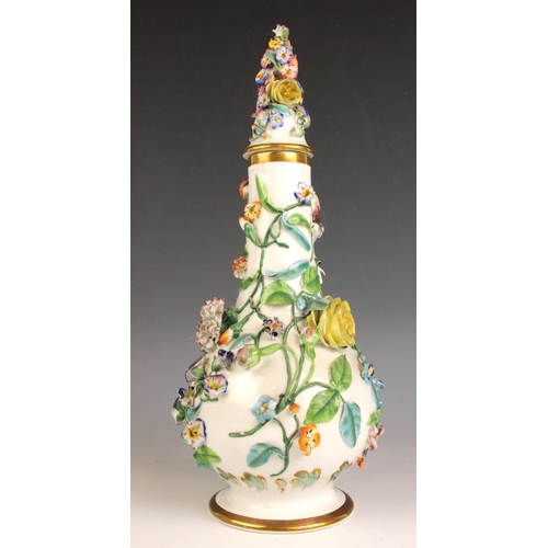 408 - An English porcelain florally encrusted stem vase, mid 19th century, of ovoid form with flared neck ... 