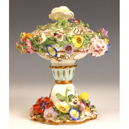 408 - An English porcelain florally encrusted stem vase, mid 19th century, of ovoid form with flared neck ... 