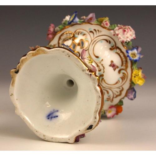 408 - An English porcelain florally encrusted stem vase, mid 19th century, of ovoid form with flared neck ... 